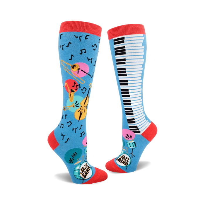 blue jazz-themed knee-high socks for women feature musical instruments and musical notes pattern with red accents.   }}