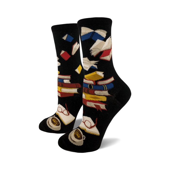 bibliophile-themed black crew socks featuring books, coffee cups, and eyeglasses in vibrant colors.   
