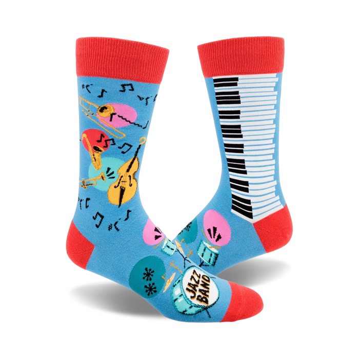 blue crew socks with musical instruments design, including saxophone, trumpet, drums, maracas, double bass, piano keys, and musical notes.   }}