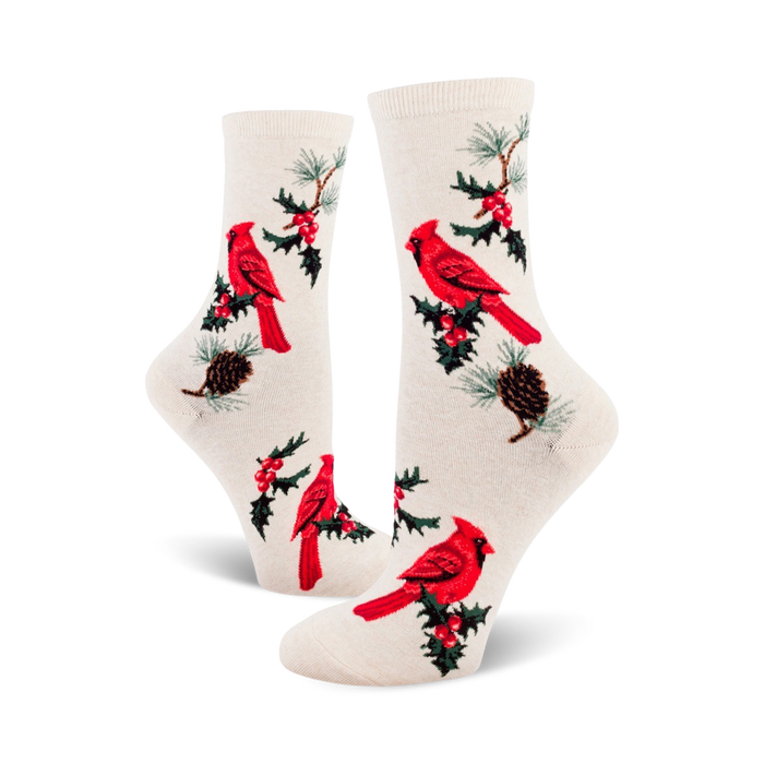 crew-length women's socks in white with a pattern of red cardinals, green pine boughs, and red berries.   }}