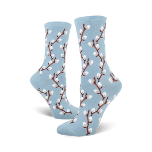 Lifestyle product shot showing a person wearing the light blue pussy willow socks.