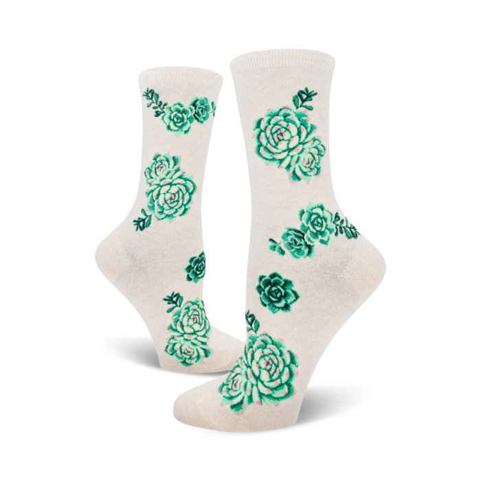 women's crew socks featuring a pattern of green succulents with pink edges.   