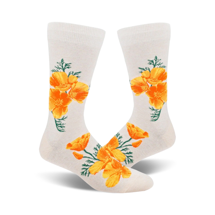Pair of off-white crew socks featuring a repeating pattern of bright orange California poppies and green leaves. }}