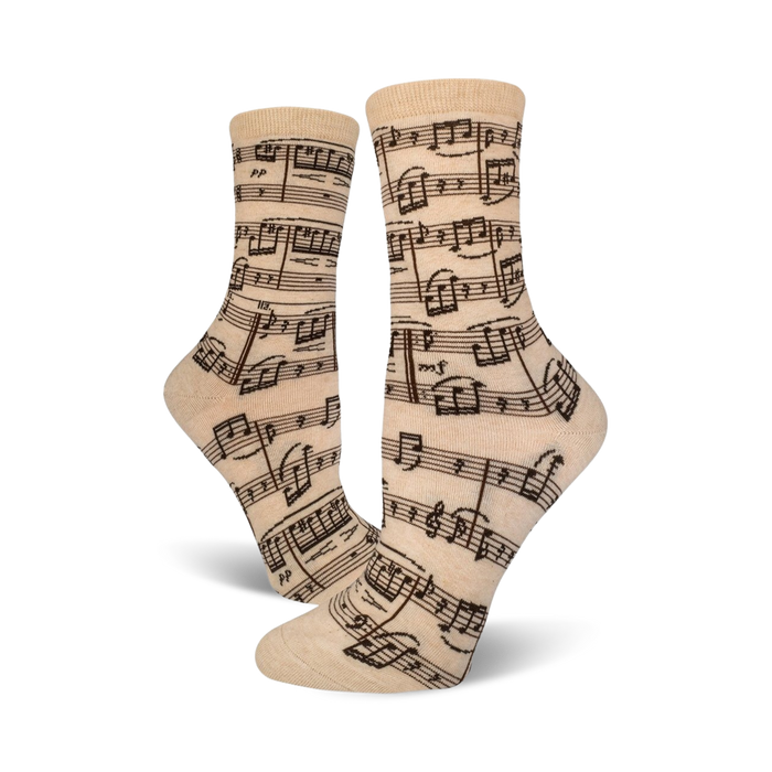 beige crew socks with a brown musical note pattern. perfect for women who love music.   