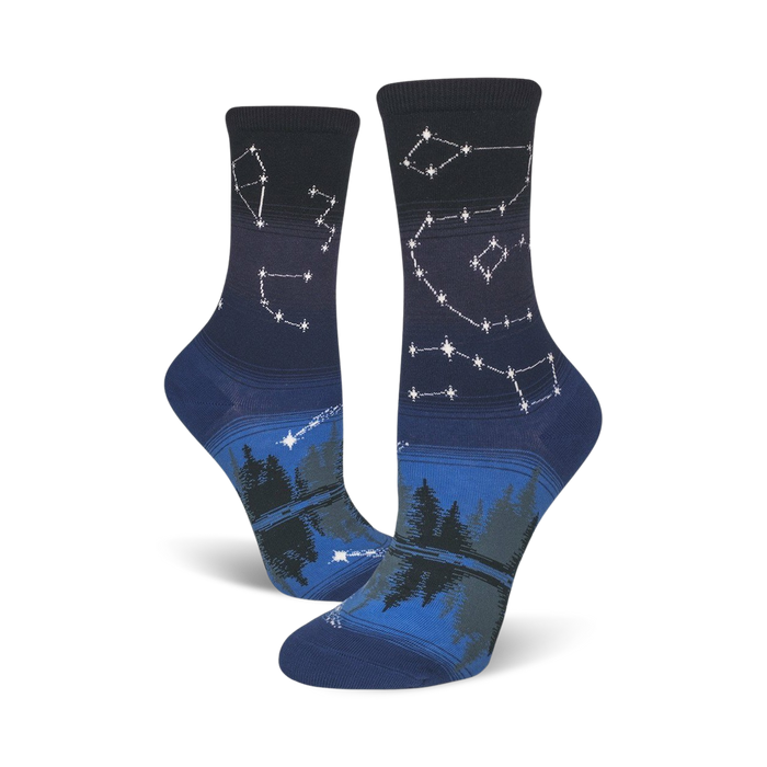 womens' crew socks - dark blue with a pattern of white stars and white and black pine trees.   }}