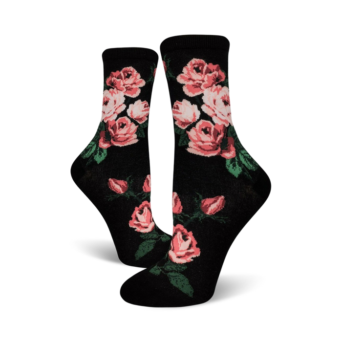black crew socks with bright pink rose pattern, green stems and leaves, perfect for women who love flowers and romance. <br> 