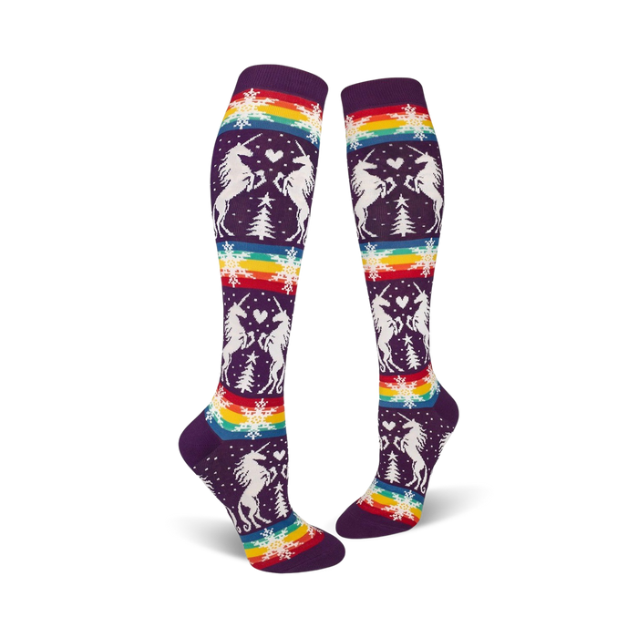 purple knee high socks featuring white unicorns, hearts, snowflakes, and rainbow designs.    }}