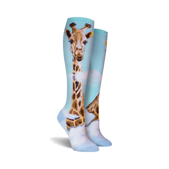 Close-up shot of the giraffe knee-high socks, highlighting the detail of the giraffe's face and pattern.