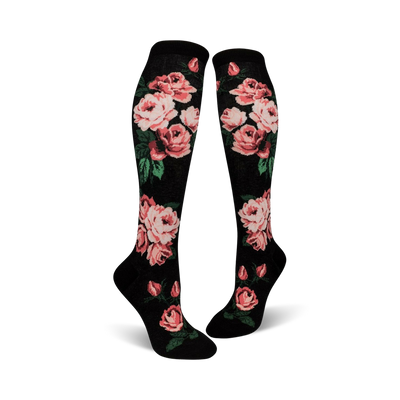 Pair of women's knee-high socks. Black background with pink roses and green leaves. One pair features black and white stripes.