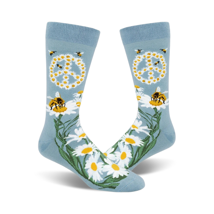 mens crew socks with a pattern of bees, flowers, and peace signs on a blue background.   }}