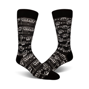 black crew socks with white musical notes provide musical motif for the feet.   