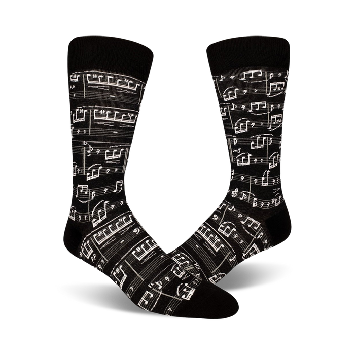 black crew socks with white musical notes provide musical motif for the feet.   
