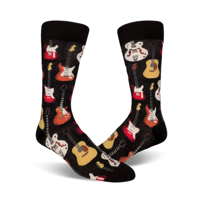 A pair of black crew socks with a colorful guitar pattern.  Red, yellow, and white guitars are featured on a black background.