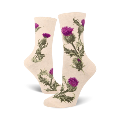Cream crew socks adorned with a repeating pattern of purple and green thistles. Botanical illustration style.