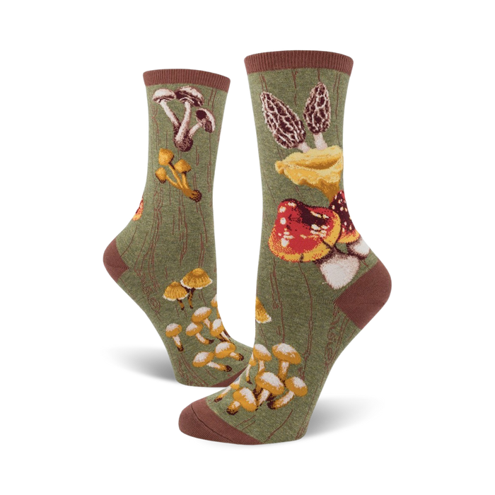 Lifestyle shot of a person wearing the Mushroom socks; the socks are green with various mushroom designs.