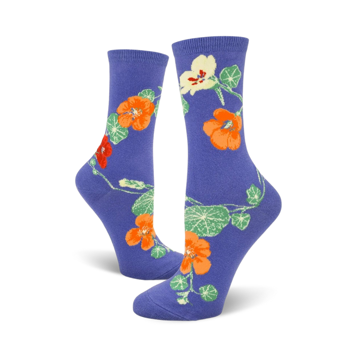 Pair of women's crew socks in purple, showcasing a whimsical nasturtium flower design in orange, red, and green.
