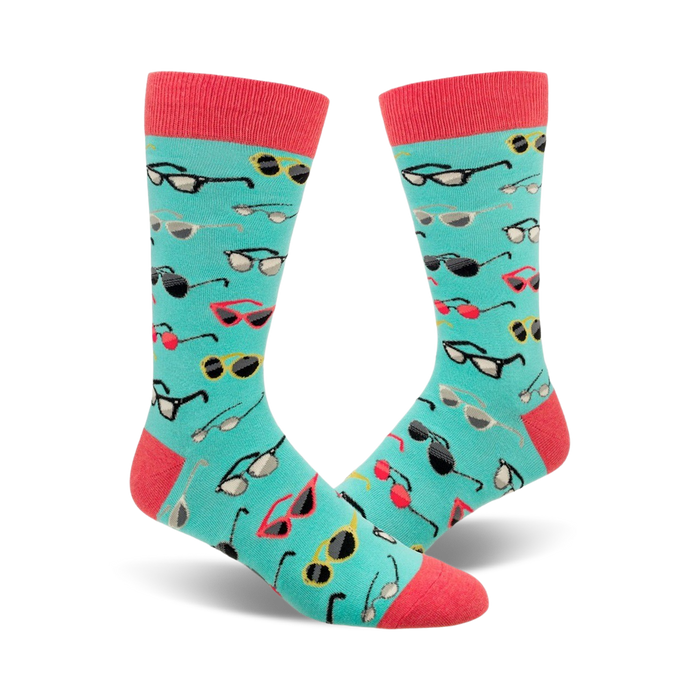 light blue mens crew socks with a cartoon sunglasses pattern in stylish summer color palette.   }}