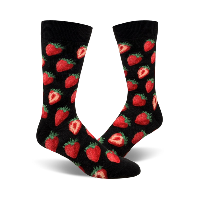 A pair of black crew socks with a red strawberry pattern. The strawberries are realistically rendered and scattered across the socks. }}