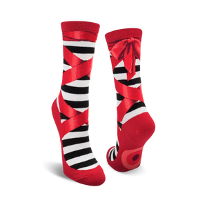A pair of black and red striped ballet slipper socks with red ribbons and bows. Fun and whimsical design.