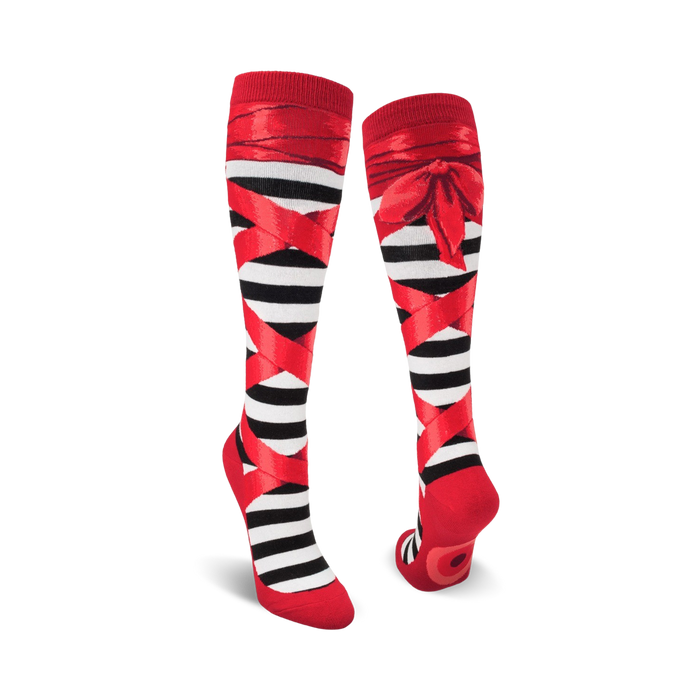   black and white striped knee-high socks with red ribbon bow, perfect for ballet-loving women.   