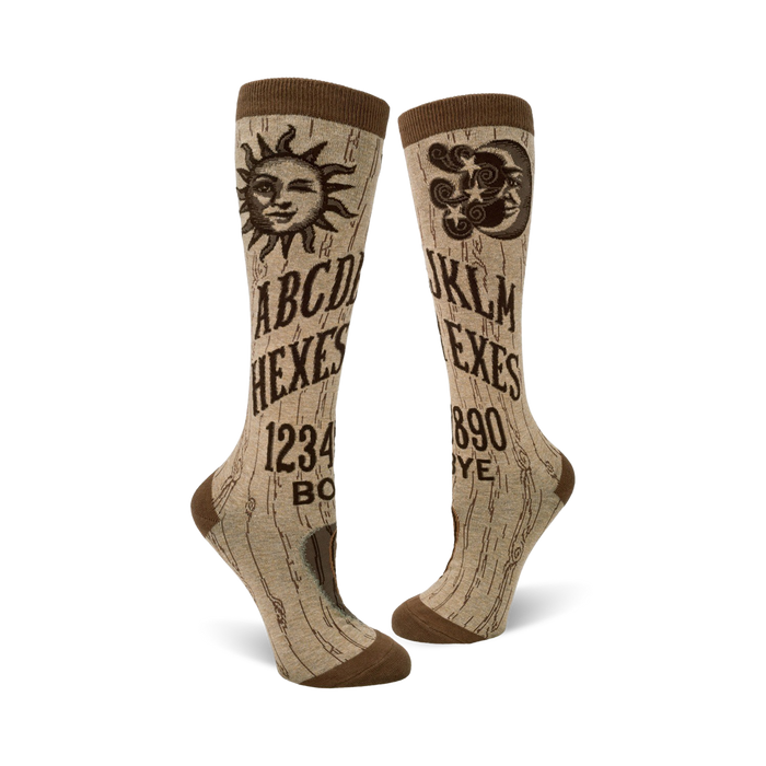 knee high brown halloween socks with planchette game board print. a-d 1-4 and j-m 5-9 letters and 
