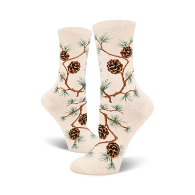 Cream crew socks with a repeating pattern of brown pinecones and green pine branches. Nature-inspired design.