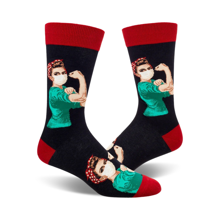 Crew socks with a navy blue background, featuring a Rosie the Riveter-style nurse wearing a mask, in teal scrubs, with red polka dot bandana. }}
