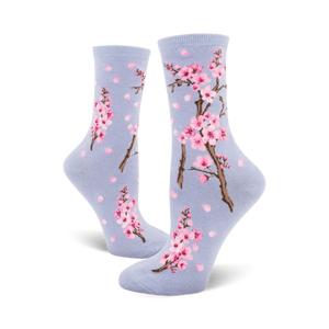 Lifestyle shot showing the lavender-colored Cherry Blossom socks on a model's feet.