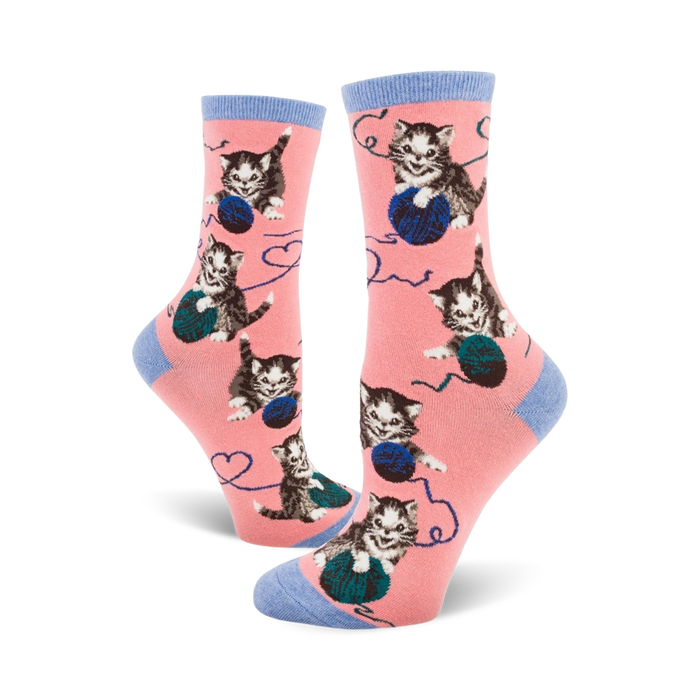 women's crew length novelty socks in pink with gray kittens playing with blue yarn balls.   }}