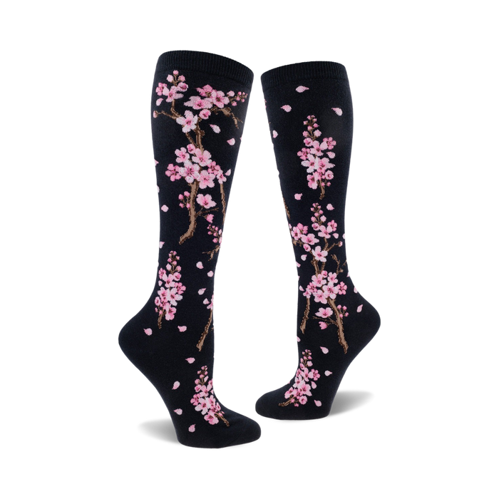 Flat lay product shot of the black Cherry Blossom knee-high socks.