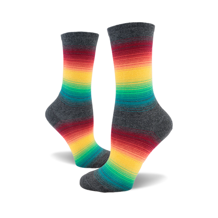 Pair of crew socks in grey with horizontal rainbow stripes of red, orange, yellow, green, and teal. }}
