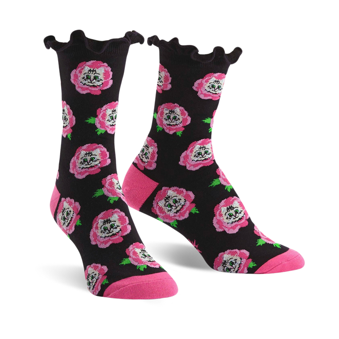 Crew socks with a black background, pink roses, and cat faces. The socks have a ruffled top edge and pink heel and toe. }}