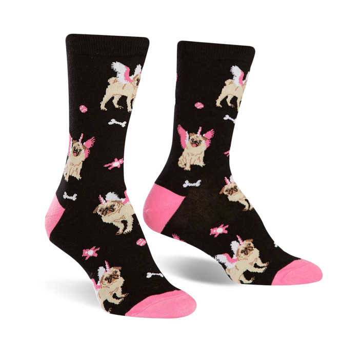 Pair of black crew socks with a fun pattern of pugs wearing unicorn horns and wings. Pink accents on the cuffs and small pink bone details. }}