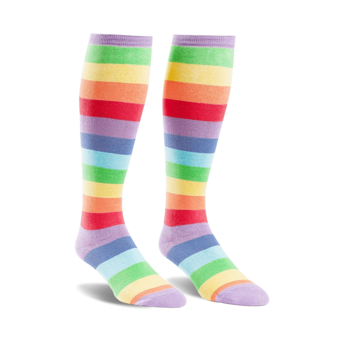 Pair of rainbow striped knee-high socks. Colors include lavender, red, orange, yellow, green, light blue. Fun and colorful. }}