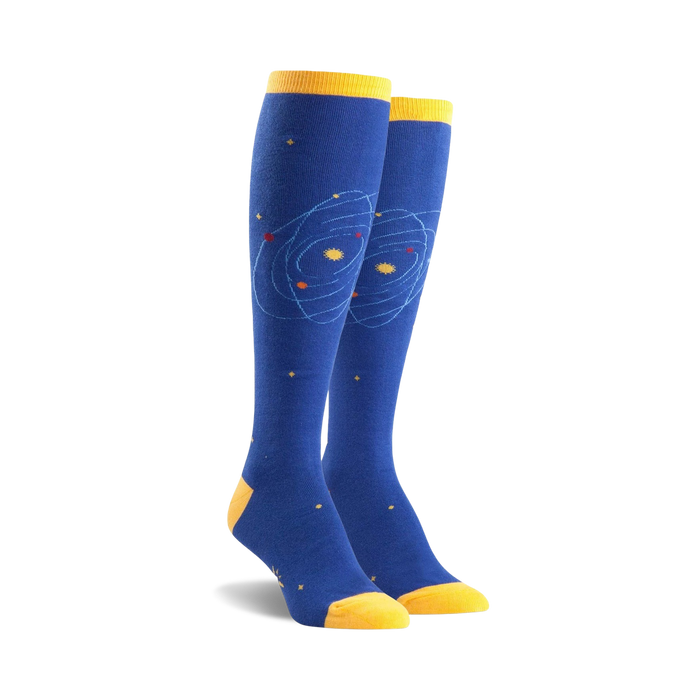 blue knee-high women's socks with planet and star pattern. space theme.  