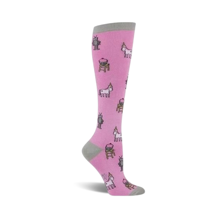 Pink knee-high socks with a whimsical pattern of unicorns, robots, and cupcakes on a light pink background. Grey cuff. }}