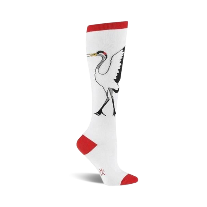 White knee-high socks with a black and white crane design. Red accents at the top and toe. }}
