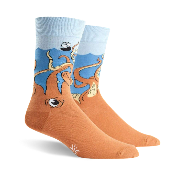 orange crew socks with blue toe, heel, and top. features an octopus with blue eyes on each sock. theme: squid. mens.  