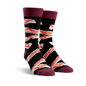 Pair of crew socks in black with a crispy bacon design and burgundy cuffs.
