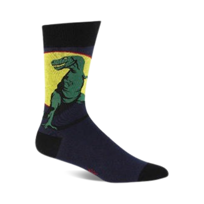 crew-length socks featuring green dinosaurs with yellow bellies and three white claws on each foot; standing on yellow crescent moon against dark blue background.    }}