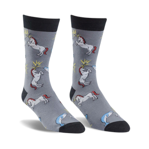 Gray crew socks featuring a whimsical design of unicorns and narwhals battling with sparks. Black cuffs.
