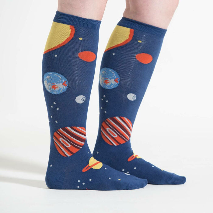 Lifestyle shot showing the Planets socks on a person's legs against a white background, from a slightly different angle.