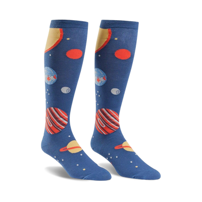 Pair of knee-high socks; navy blue with colorful planets, stars, and a yellow sun design.