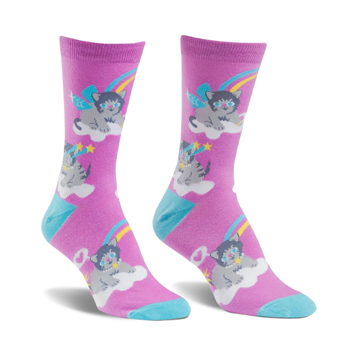 pink socks with a cartoonish pattern of cats wearing party hats and rainbow wings sitting on clouds against a starry and moonlit sky.   }}