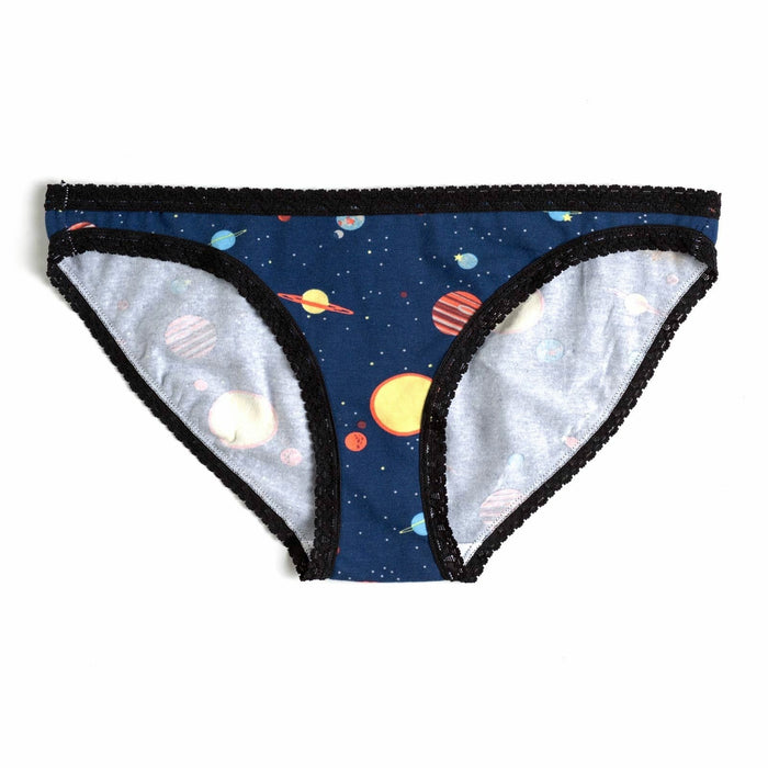 A pair of women's navy blue hipster underwear with a colorful planets and stars print and black lace trim. }}