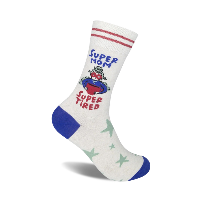 Cream crew socks with blue and red accents.  Features a cartoon mom in a cape, and the text 'Super Mom Super Tired'. }}