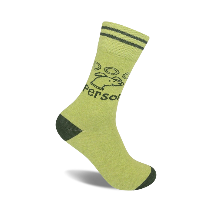 Lime green crew socks with dark green stripes at the top and a dark green graphic of a dog and paw prints. }}