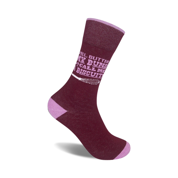 Burgundy crew socks with a lilac design. Text reads,