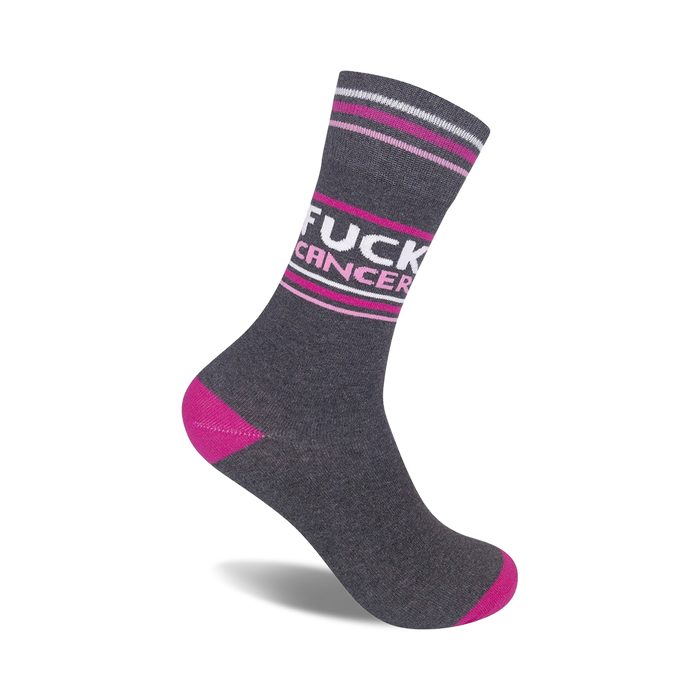 gray crew socks with '{fuck cancer}' in large pink letters, pink heel and toe.   