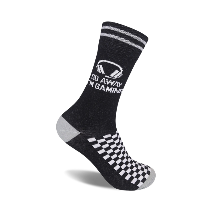 Black crew socks with white checkered pattern at the bottom and a graphic that says 'Go Away I'm Gaming' with a headset image. }}